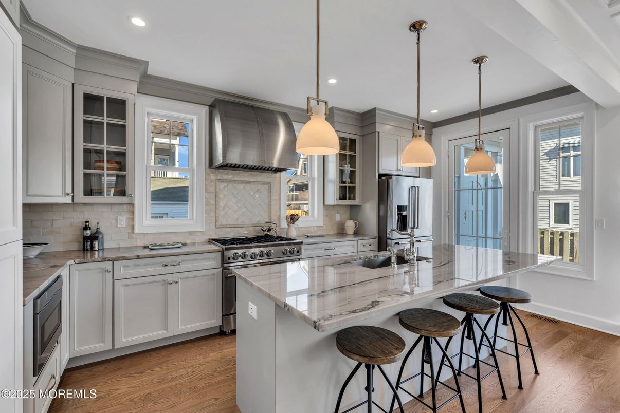 Interior, Kitchen, Pendant Lights, Recessed Lighting, Stainless Steel Appliances, Wood Texture Flooring