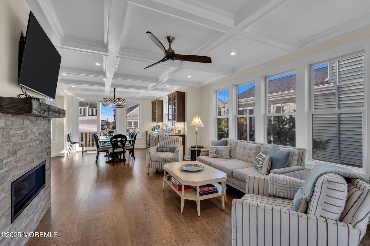 Dining room, Fireplace, Interior, Living room, Pendant Lights, Recessed Lighting, Stone Walls, Wood Texture Flooring