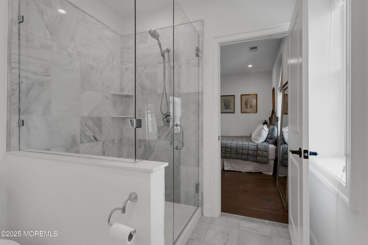 Bathroom, Bedroom, Glass Shower, Interior, Marble, Marble Walls, Recessed Lighting, Wood Texture Flooring