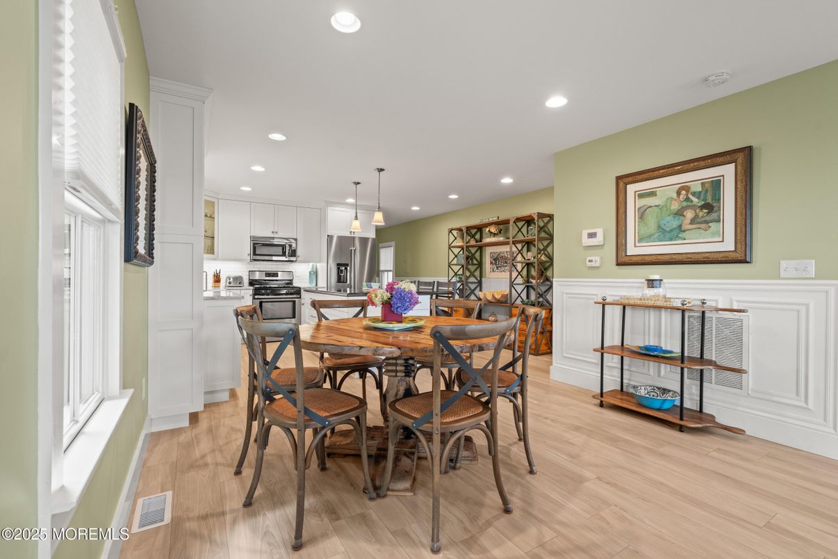 Dining room, Interior, Kitchen, Pendant Lights, Recessed Lighting, Stainless Steel Appliances, Wood Texture Flooring
