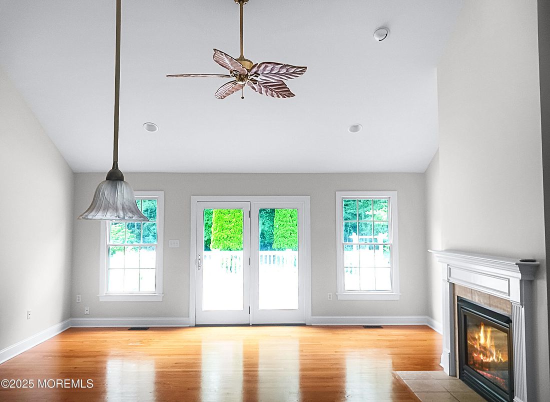 Empty room, Fireplace, Interior, Pendant Lights, Recessed Lighting, Wood Texture Flooring