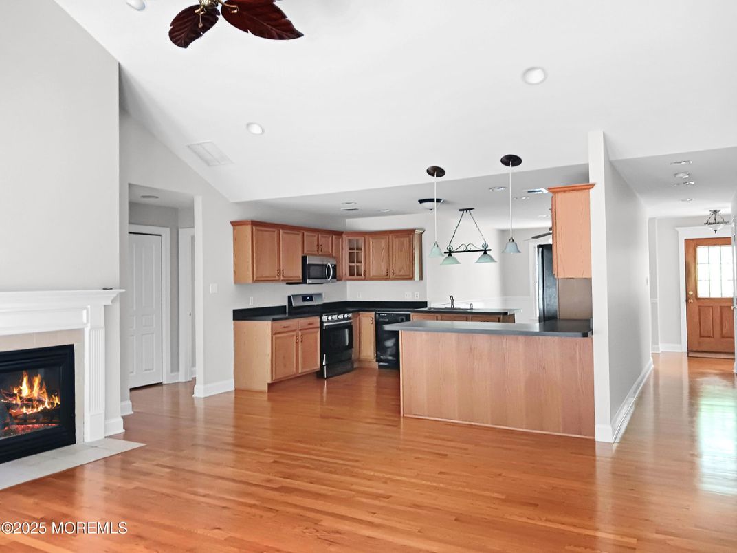 Fireplace, Interior, Kitchen, Pendant Lights, Recessed Lighting, Wood Texture Flooring