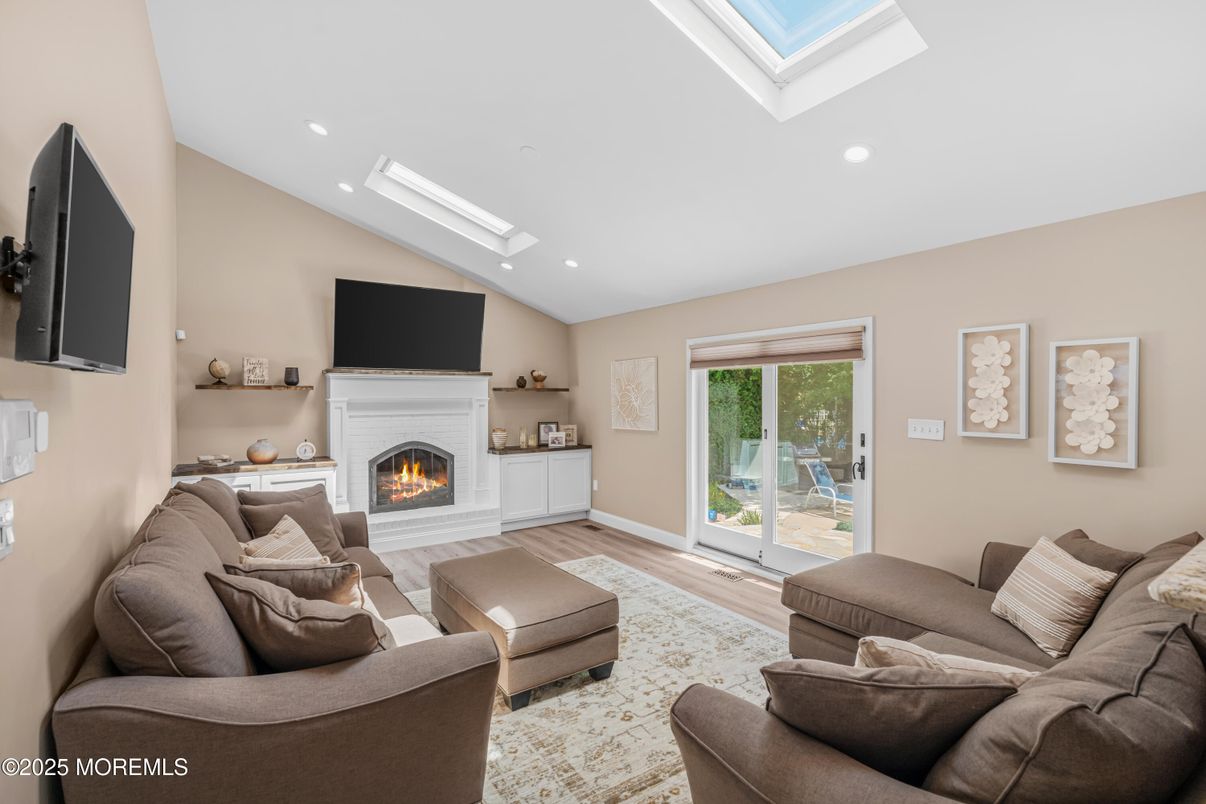 Fireplace, Interior, Living room, Recessed Lighting, Wood Texture Flooring