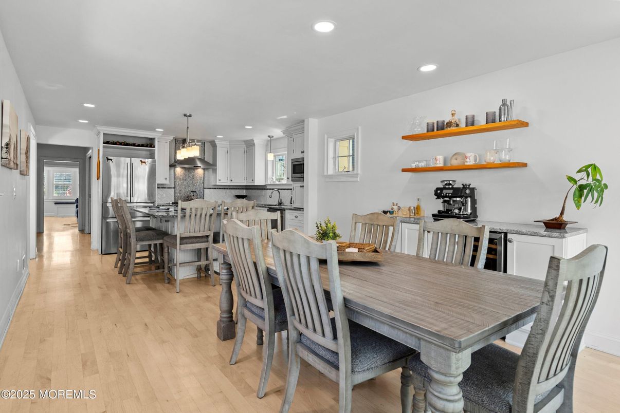 Dining room, Interior, Kitchen, Pendant Lights, Recessed Lighting, Stainless Steel Appliances, Wood Texture Flooring