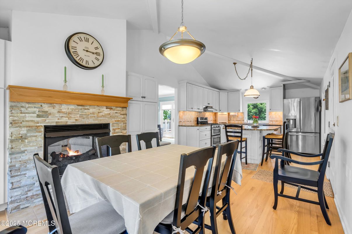 Dining room, Fireplace, Interior, Kitchen, Pendant Lights, Stone Walls, Wood Texture Flooring