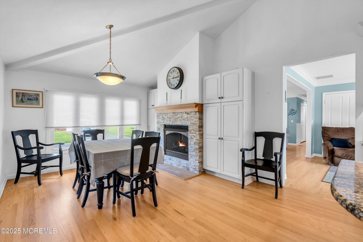 Dining room, Fireplace, Interior, Pendant Lights, Wood Texture Flooring