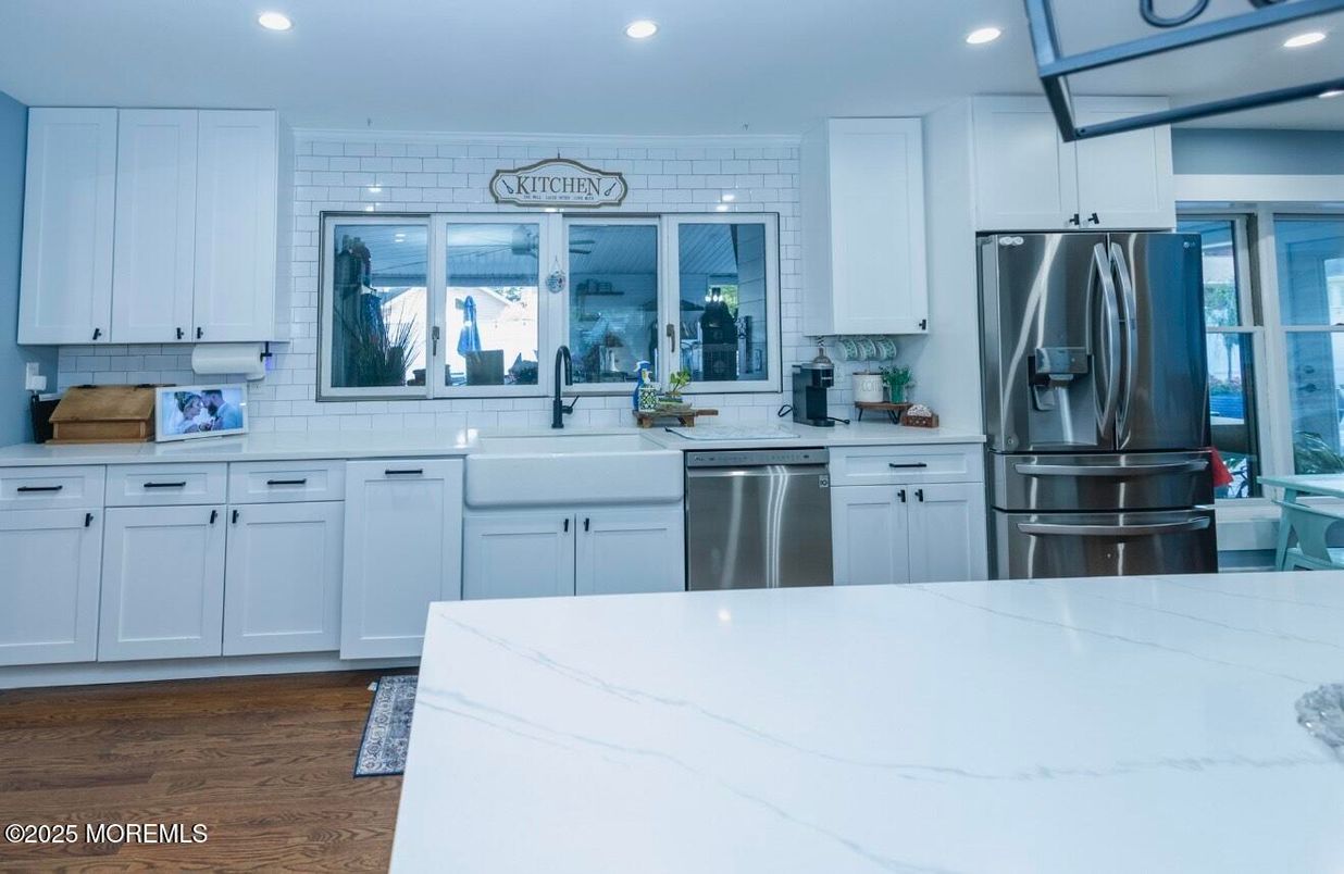 Interior, Kitchen, Recessed Lighting, Stainless Steel Appliances, Stone Walls, Wood Texture Flooring