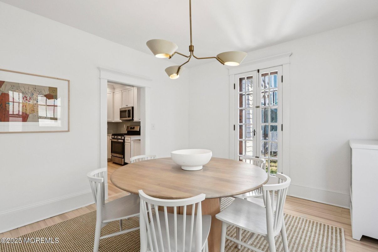 Dining room, Interior, Kitchen, Pendant Lights, Stainless Steel Appliances, Wood Texture Flooring