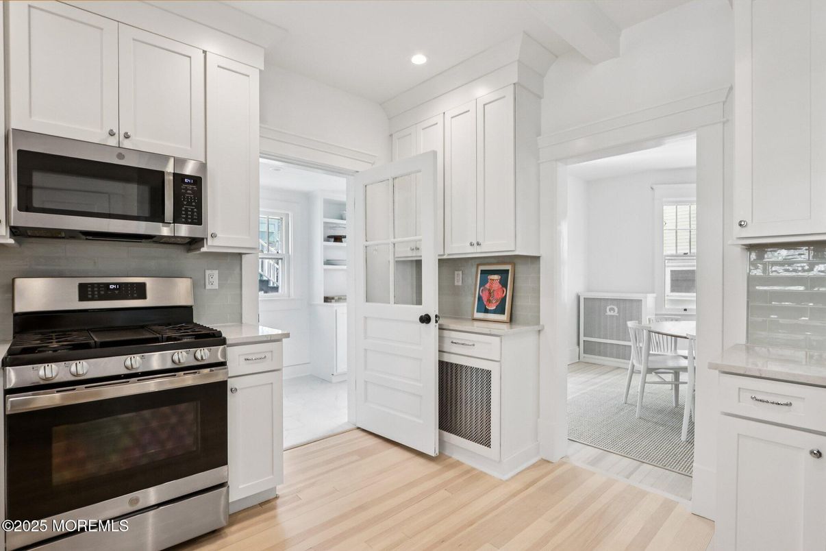 Dining room, Interior, Kitchen, Recessed Lighting, Stainless Steel Appliances, Wood Texture Flooring