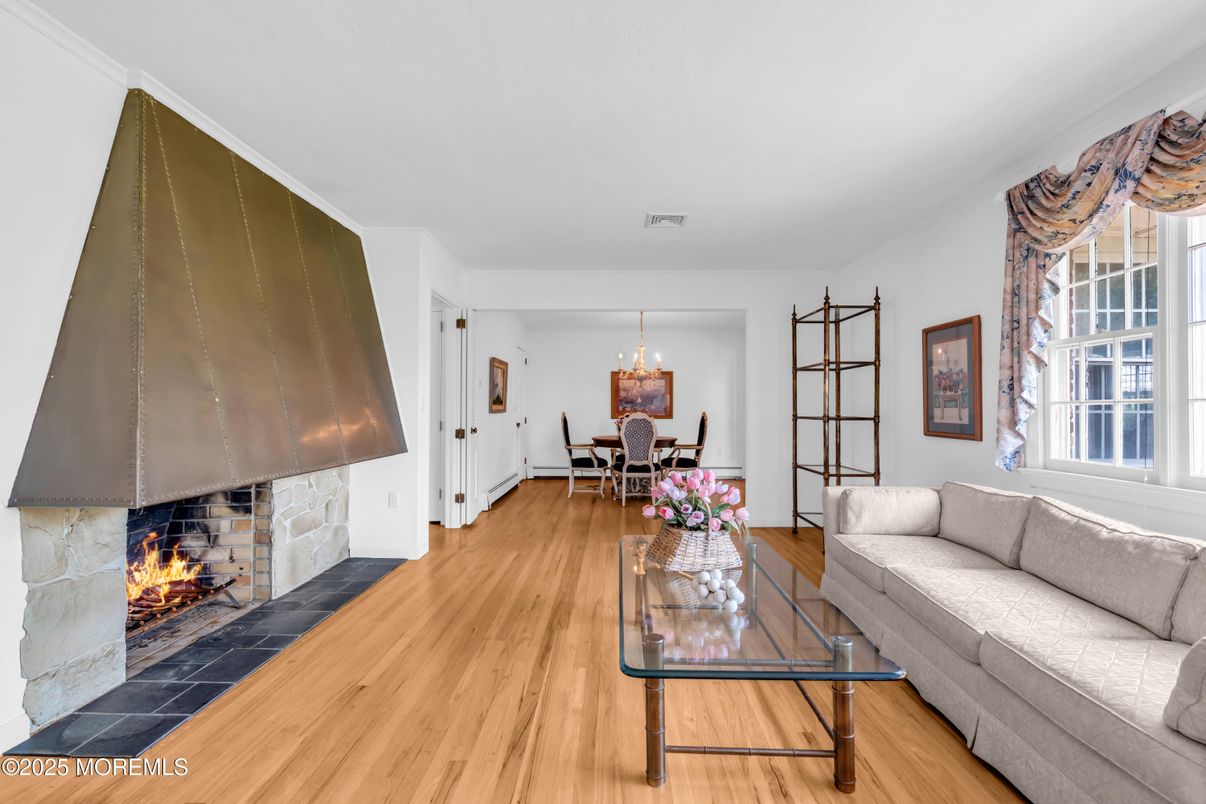 Chandelier, Dining room, Fireplace, Interior, Living room, Pendant Lights, Wood Texture Flooring
