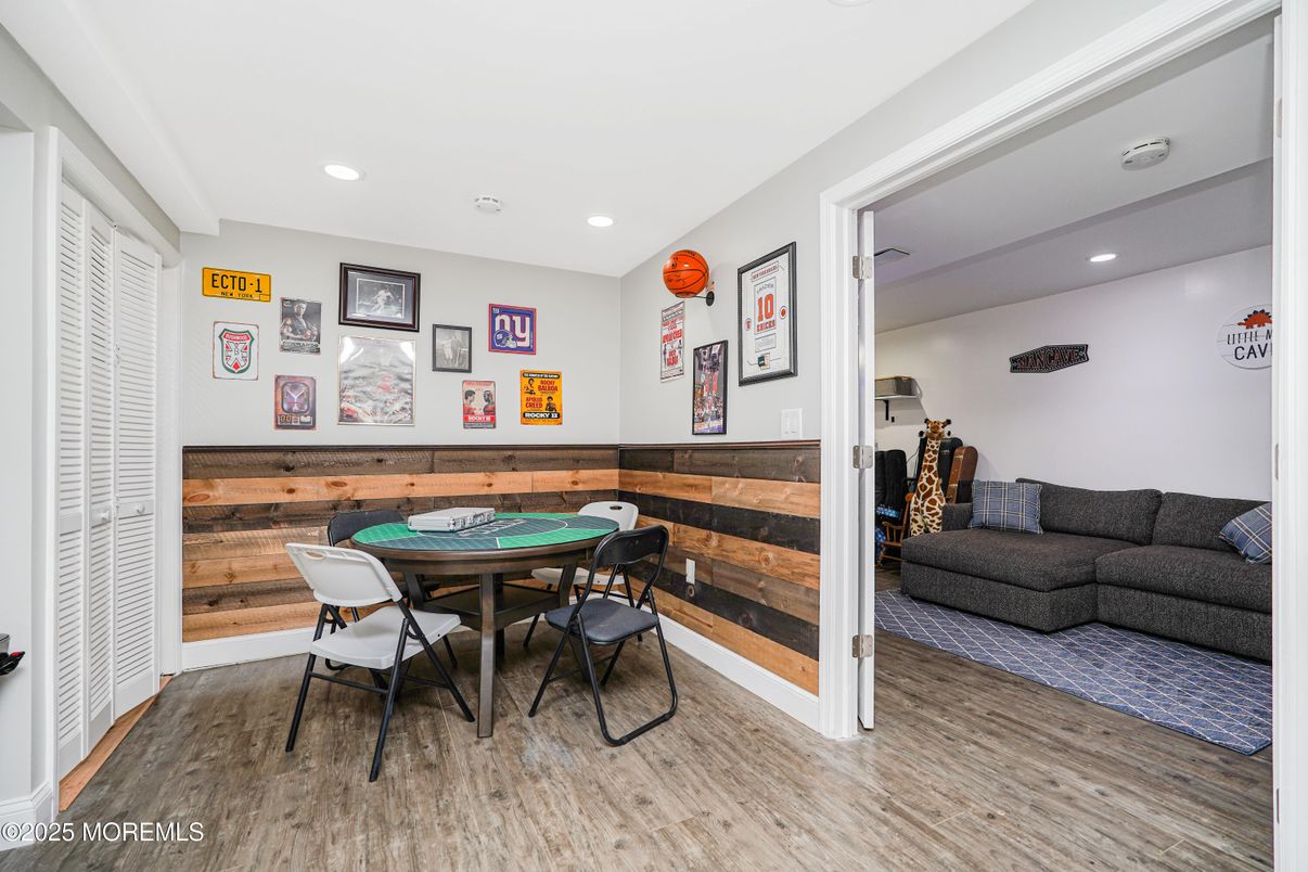 Dining room, Game Room, Interior, Recessed Lighting, Wood Texture Flooring, Wooden Walls