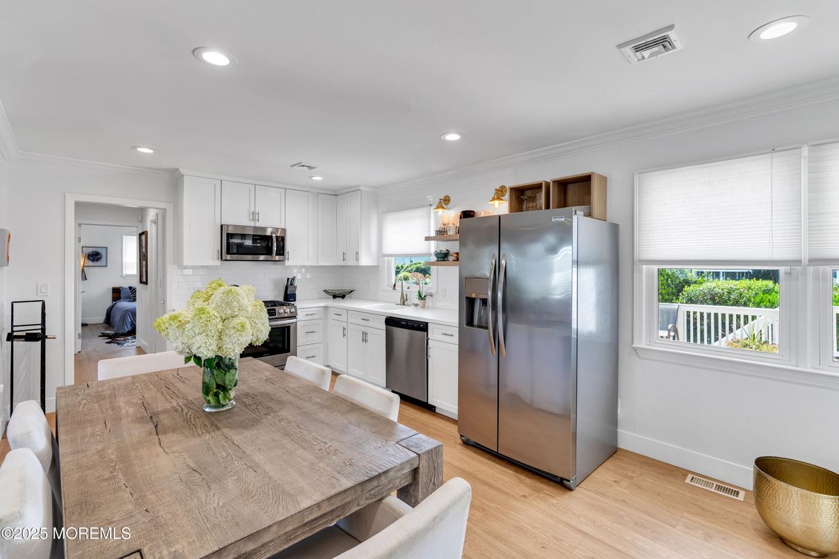 Dining room, Interior, Kitchen, Recessed Lighting, Stainless Steel Appliances, Wood Texture Flooring