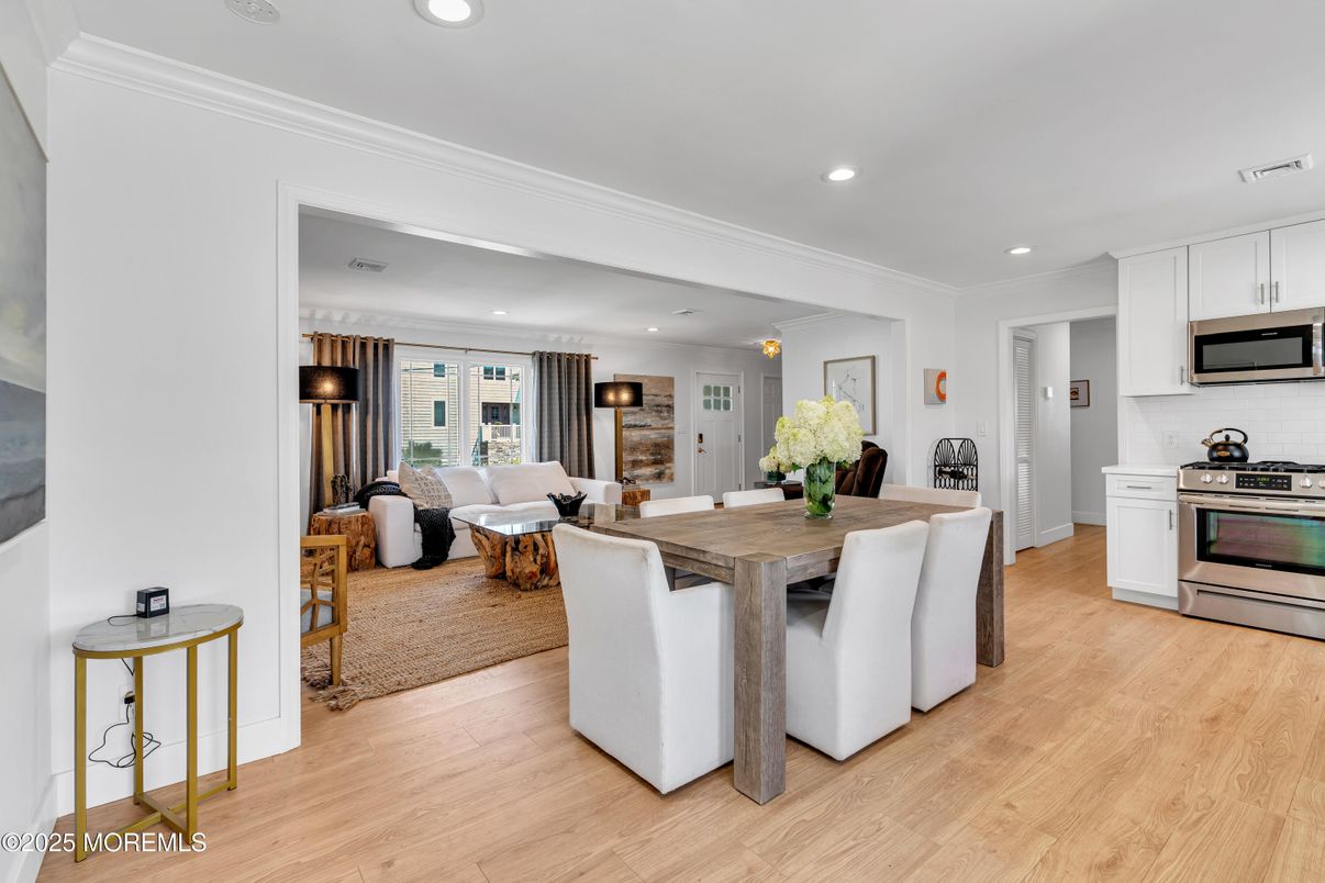 Dining room, Interior, Kitchen, Living room, Recessed Lighting, Stainless Steel Appliances, Wood Texture Flooring
