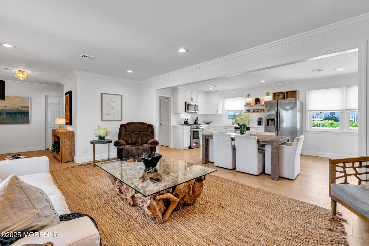 Dining room, Interior, Kitchen, Living room, Recessed Lighting, Stainless Steel Appliances, Wood Texture Flooring