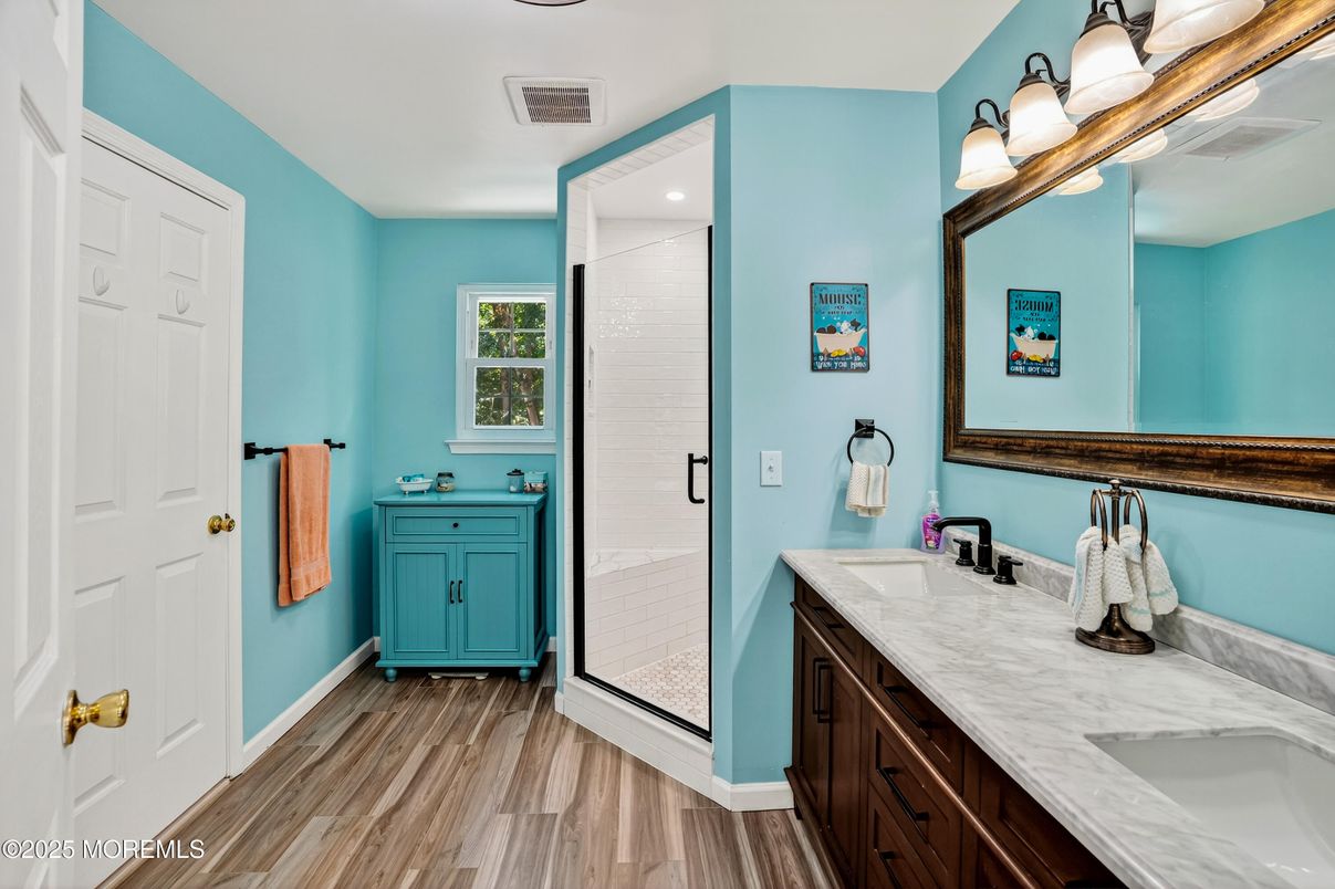 Bathroom, Dual Sink Vanities, Interior, Recessed Lighting, Wood Texture Flooring