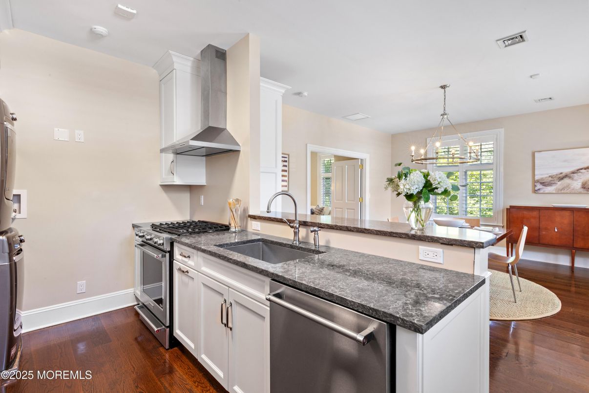 Dining room, Interior, Kitchen, Pendant Lights, Recessed Lighting, Stainless Steel Appliances, Wood Texture Flooring