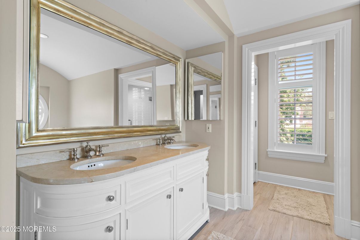 Bathroom, Dual Sink Vanities, Interior, Recessed Lighting, Wood Texture Flooring