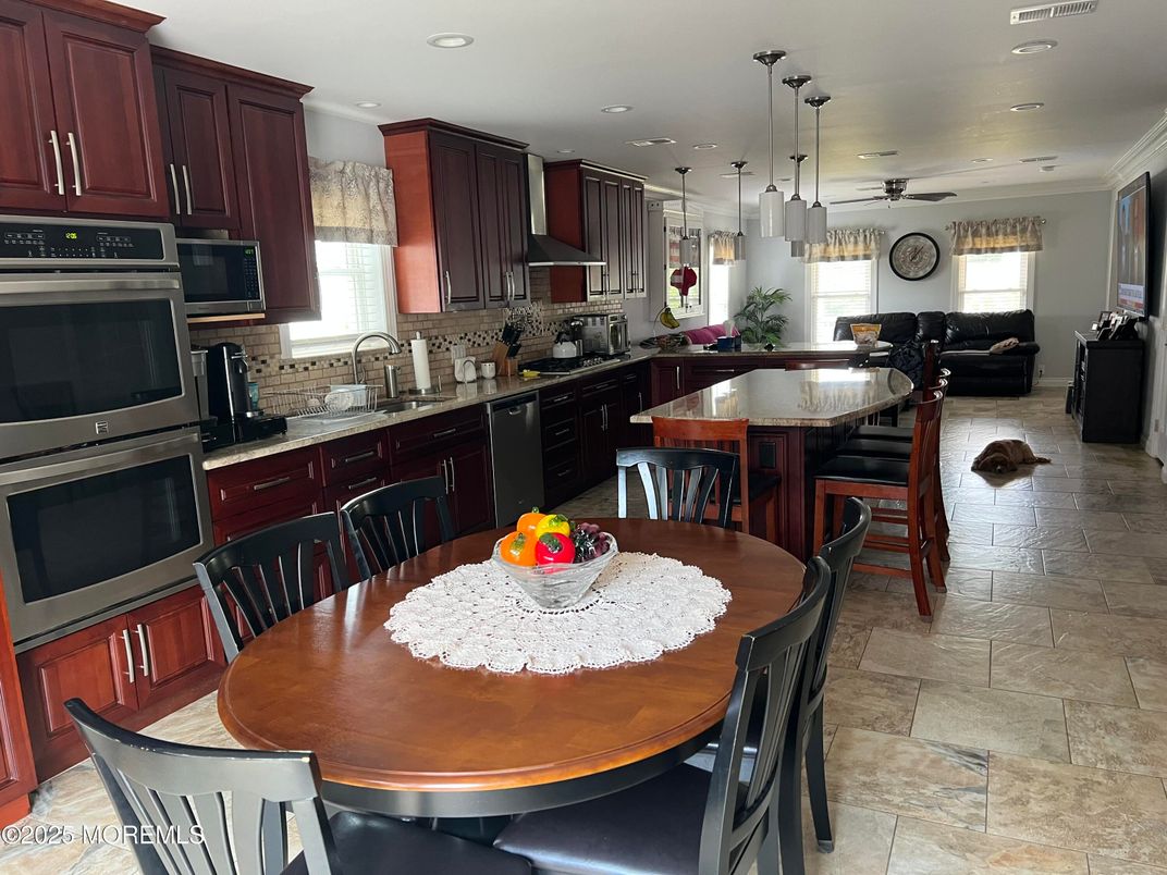 Dining room, Interior, Kitchen, Living room, Pendant Lights, Recessed Lighting, Stainless Steel Appliances