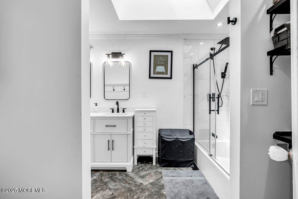 Bathroom, Dual Sink Vanities, Glass Shower, Interior, Marble Walls, Recessed Lighting