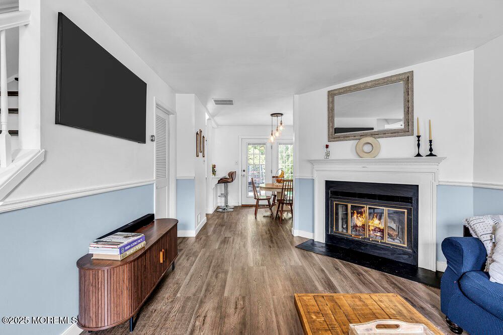 Dining room, Fireplace, Interior, Pendant Lights, Wood Texture Flooring
