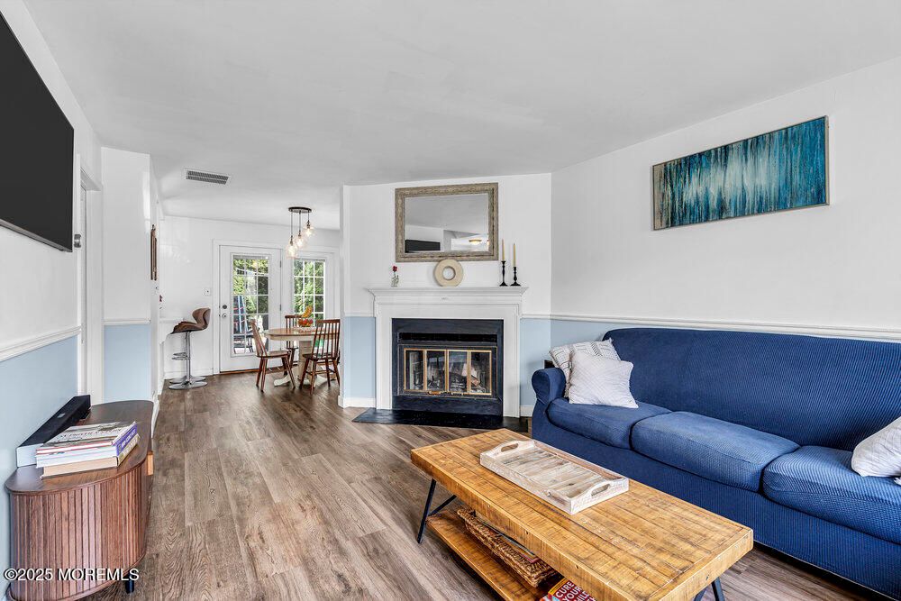 Dining room, Fireplace, Interior, Living room, Pendant Lights, Wood Texture Flooring