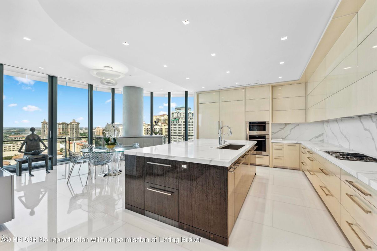 Interior, Kitchen, Marble Walls, Recessed Lighting, Stainless Steel Appliances