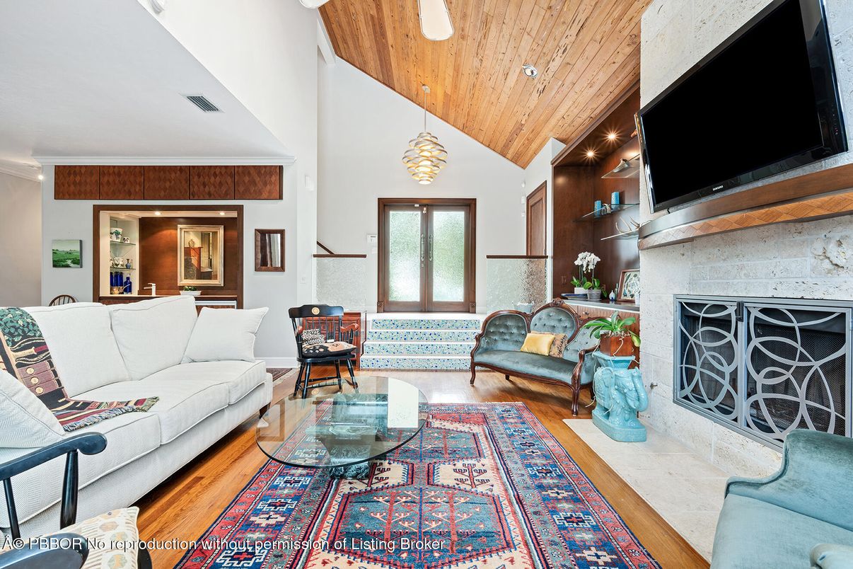 Dining room, Fireplace, Interior, Living room, Pendant Lights, Recessed Lighting, Wooden Ceilings, Wood Texture Flooring