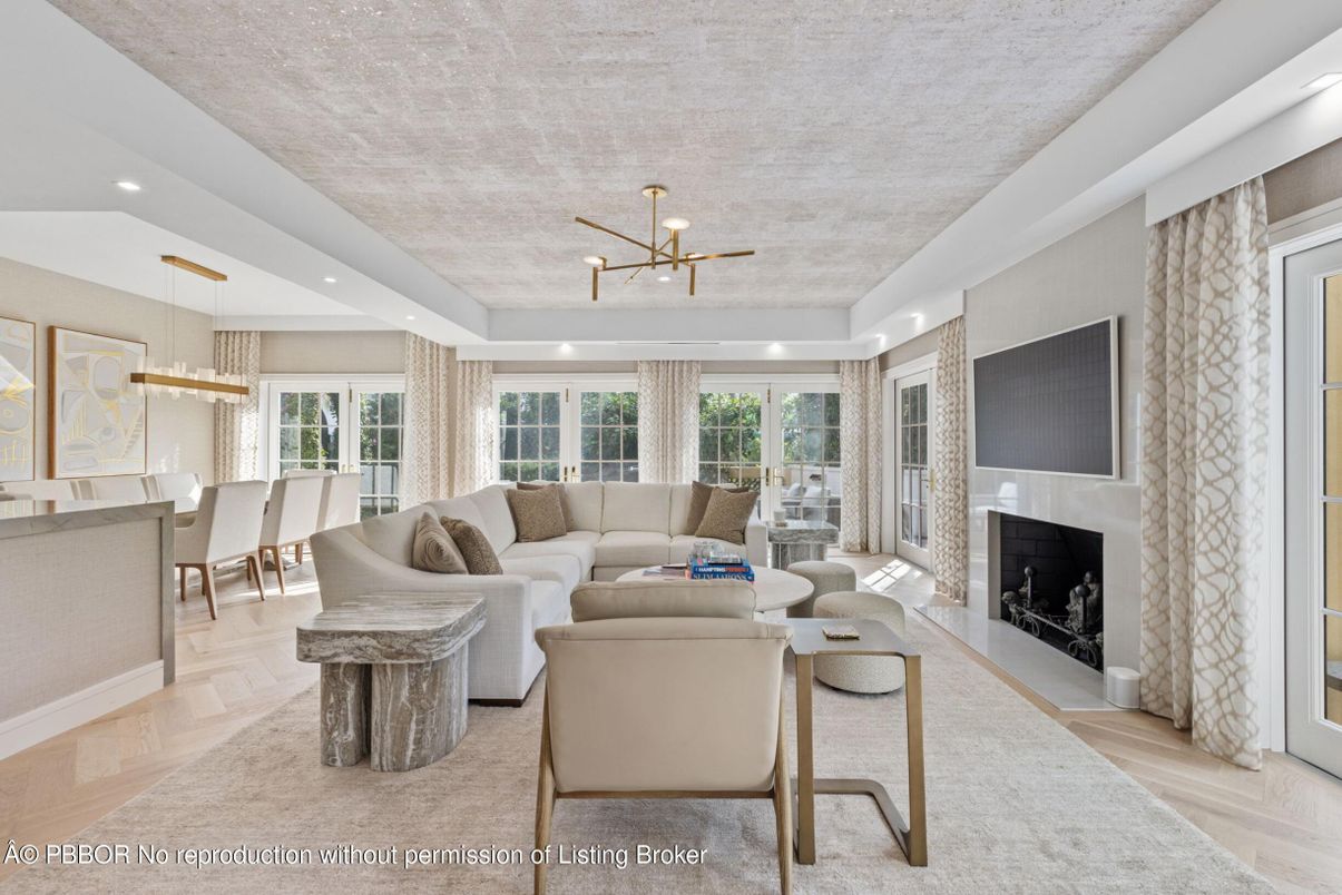 Dining room, Fireplace, Interior, Living room, Pendant Lights, Recessed Lighting, Wood Texture Flooring