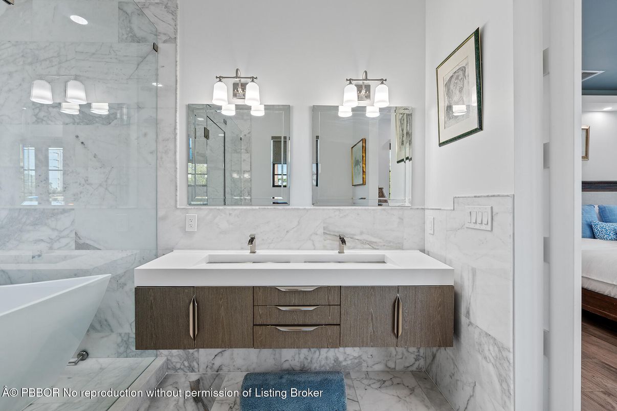 Bathroom, Dual Sink Vanities, Glass Shower, Interior, Marble, Marble Walls, Recessed Lighting