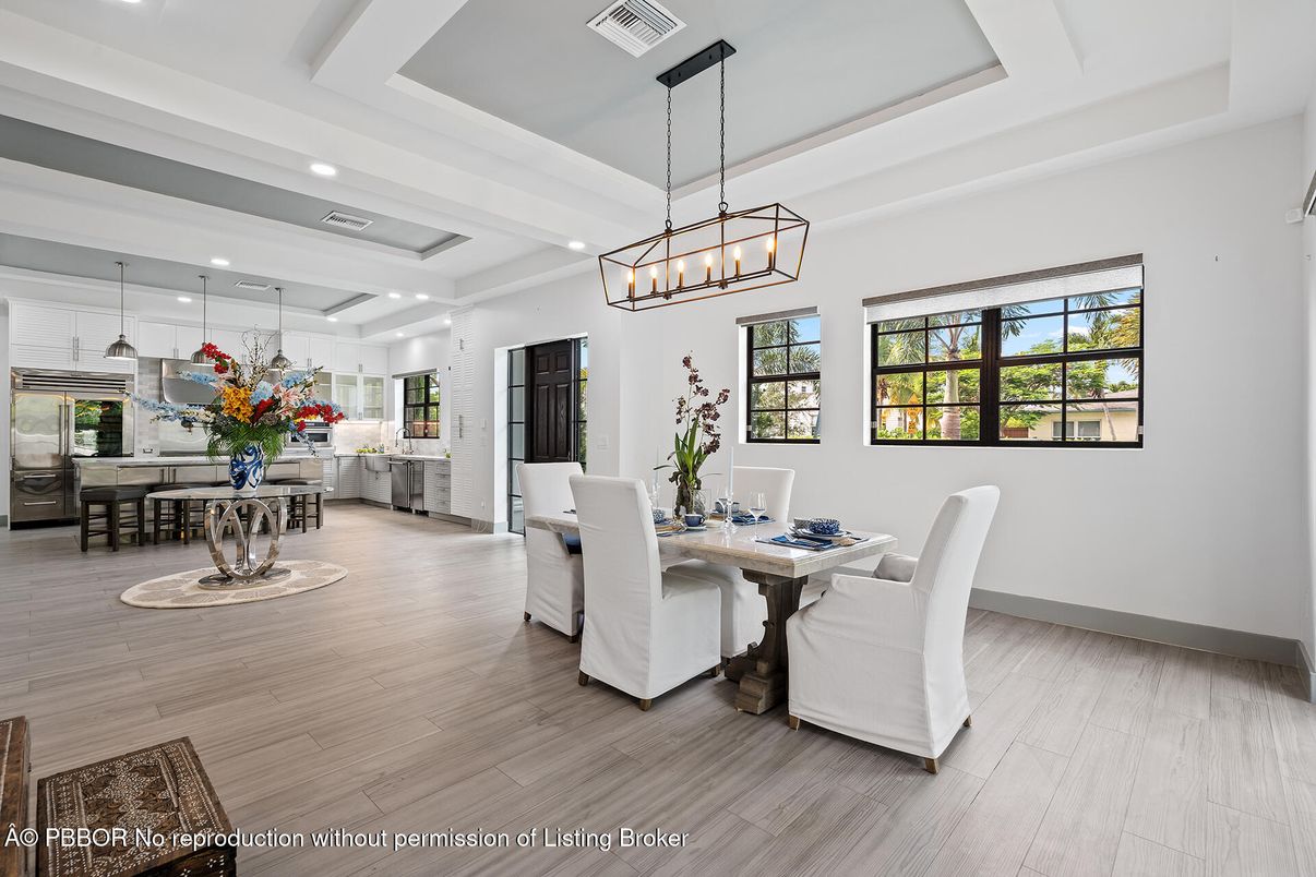 Chandelier, Dining room, Interior, Kitchen, Pendant Lights, Recessed Lighting, Stainless Steel Appliances, Wood Texture Flooring