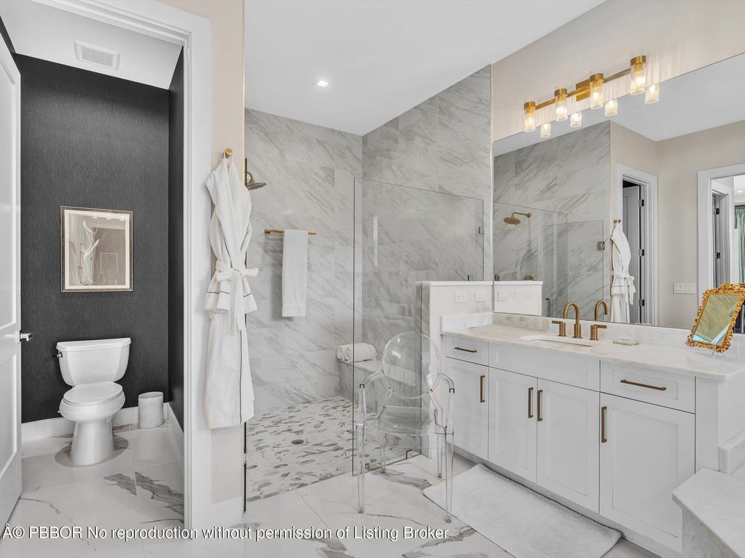 Bathroom, Dual Sink Vanities, Glass Shower, Interior, Marble, Marble Walls, Recessed Lighting
