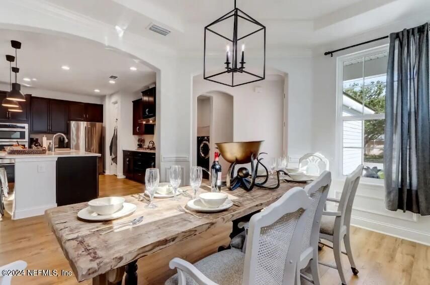 Dining room, Interior, Kitchen, Pendant Lights, Recessed Lighting, Stainless Steel Appliances, Wood Texture Flooring