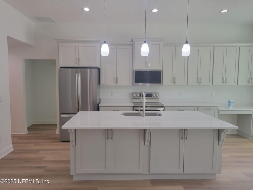 Interior, Kitchen, Pendant Lights, Recessed Lighting, Stainless Steel Appliances, Wood Texture Flooring