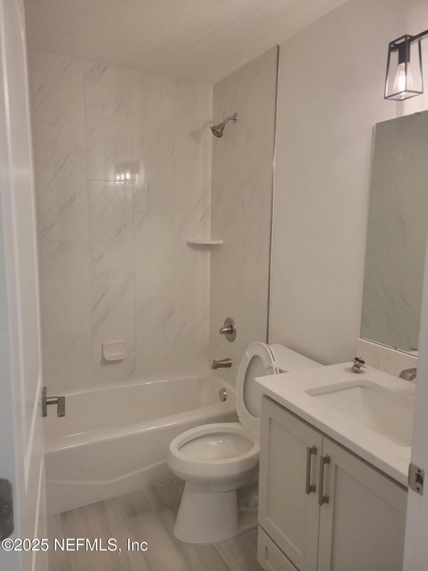 Bathroom, Dual Sink Vanities, Interior, Marble Walls, Wood Texture Flooring