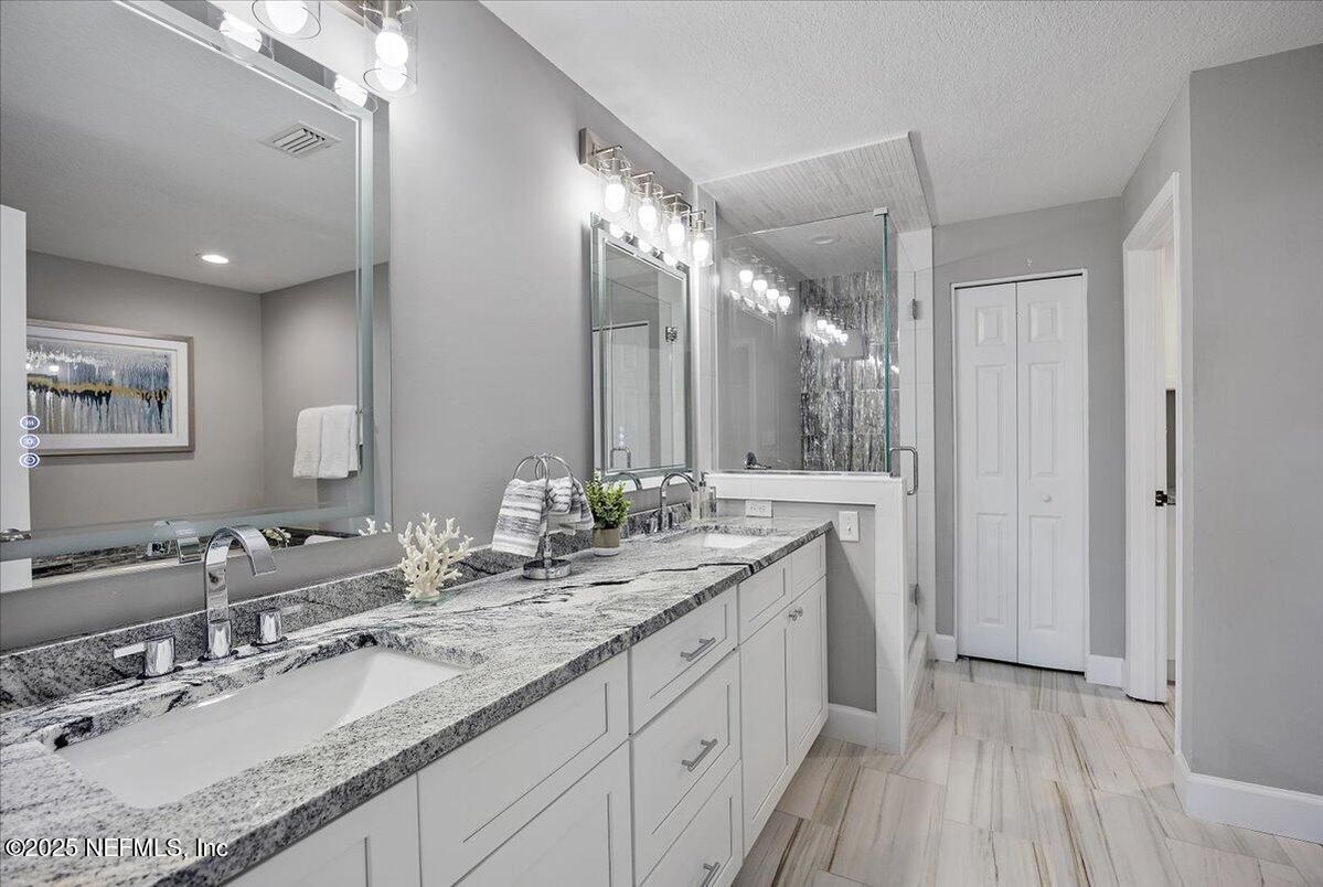 Bathroom, Dual Sink Vanities, Glass Shower, Interior, Recessed Lighting, Wood Texture Flooring