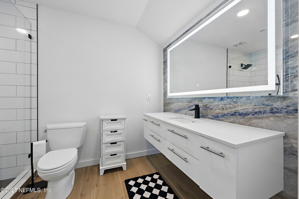 Bathroom, Dual Sink Vanities, Interior, Recessed Lighting, Wood Texture Flooring