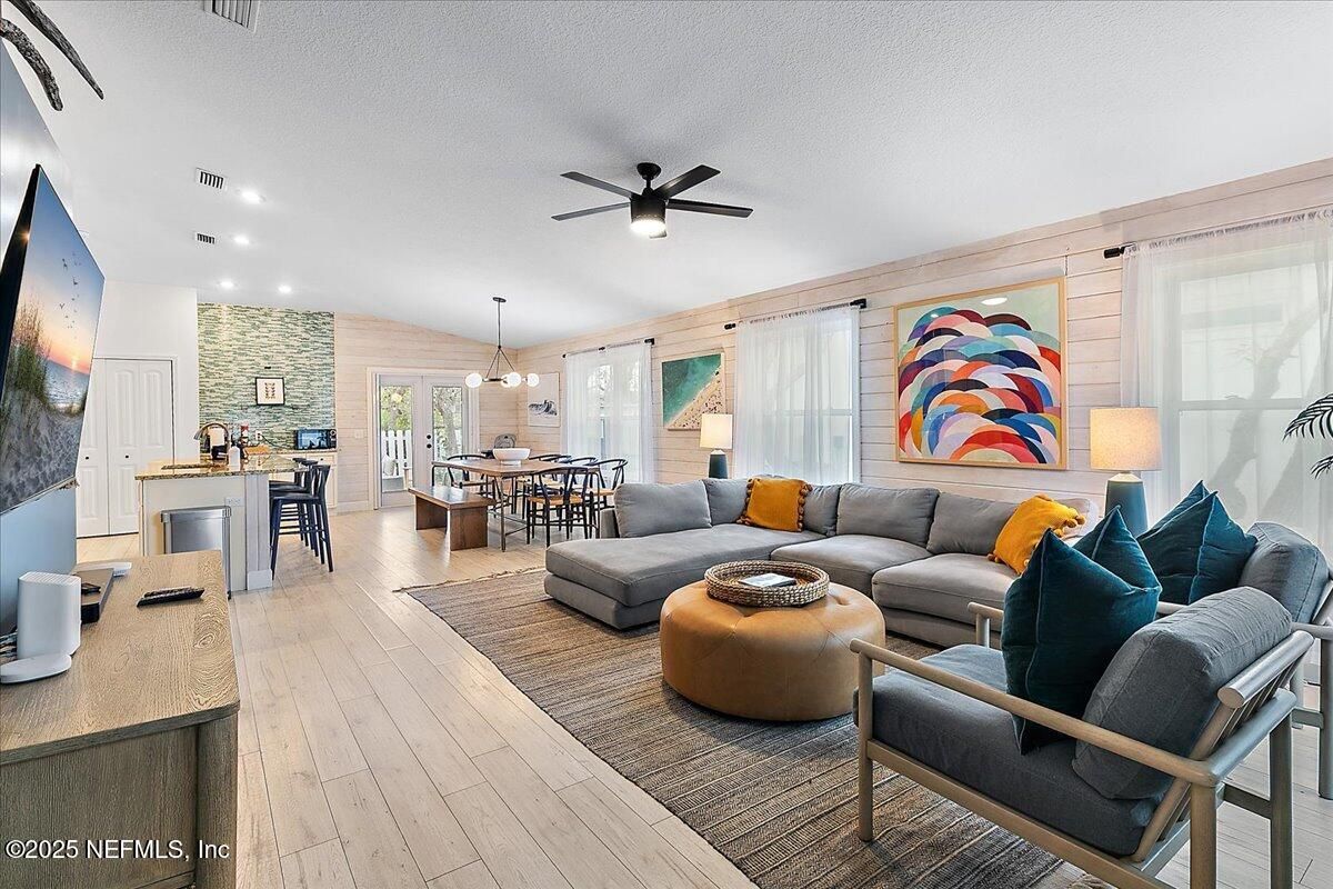 Dining room, Interior, Living room, Pendant Lights, Recessed Lighting, Stone Walls, Wood Texture Flooring