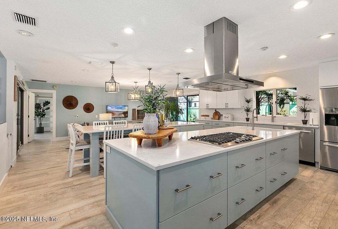 Dining room, Interior, Kitchen, Pendant Lights, Recessed Lighting, Stainless Steel Appliances, Wood Texture Flooring