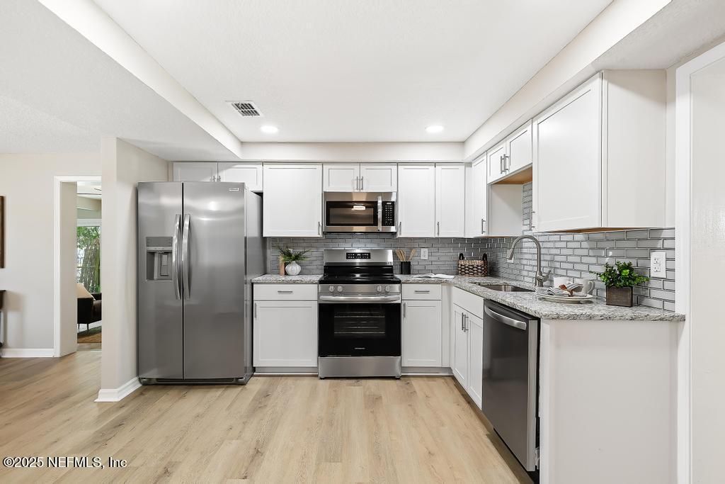 Interior, Kitchen, Recessed Lighting, Stainless Steel Appliances, Wood Texture Flooring