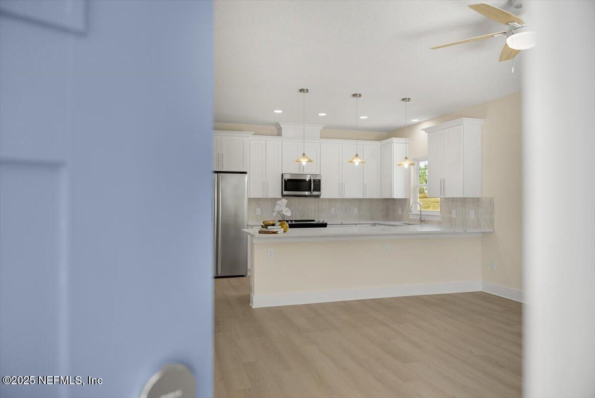 Interior, Kitchen, Pendant Lights, Recessed Lighting, Stainless Steel Appliances, Wood Texture Flooring