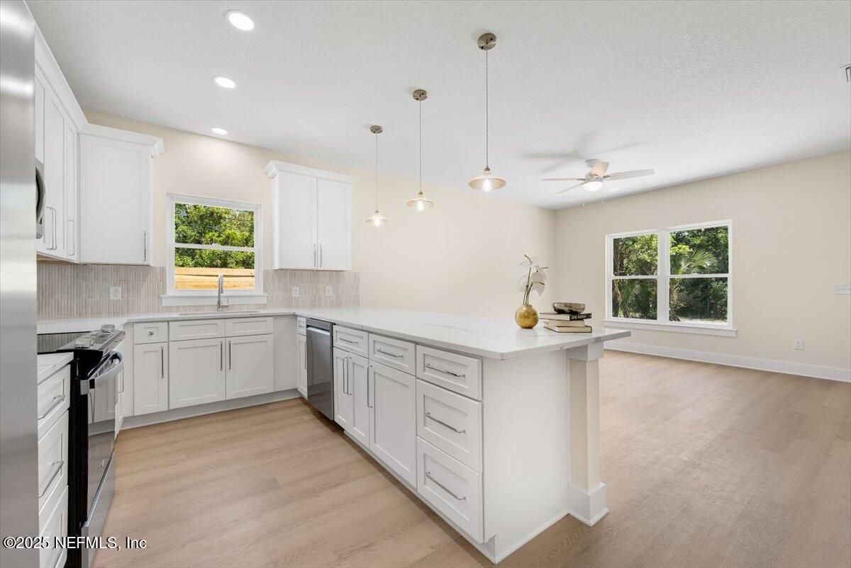 Interior, Kitchen, Pendant Lights, Recessed Lighting, Stainless Steel Appliances, Wood Texture Flooring