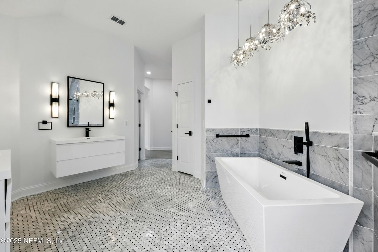 Bathroom, Dual Sink Vanities, Free Standing Baths, Interior, Marble Walls, Pendant Lights, Recessed Lighting
