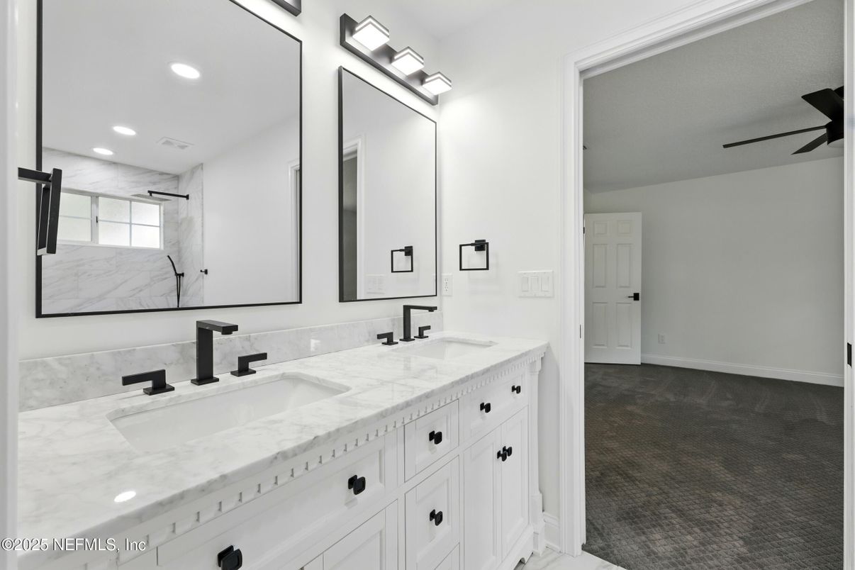 Bathroom, Dual Sink Vanities, Interior, Marble Walls, Recessed Lighting