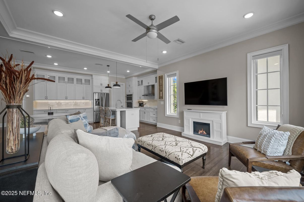 Fireplace, Interior, Kitchen, Living room, Pendant Lights, Recessed Lighting, Stainless Steel Appliances, Wood Texture Flooring