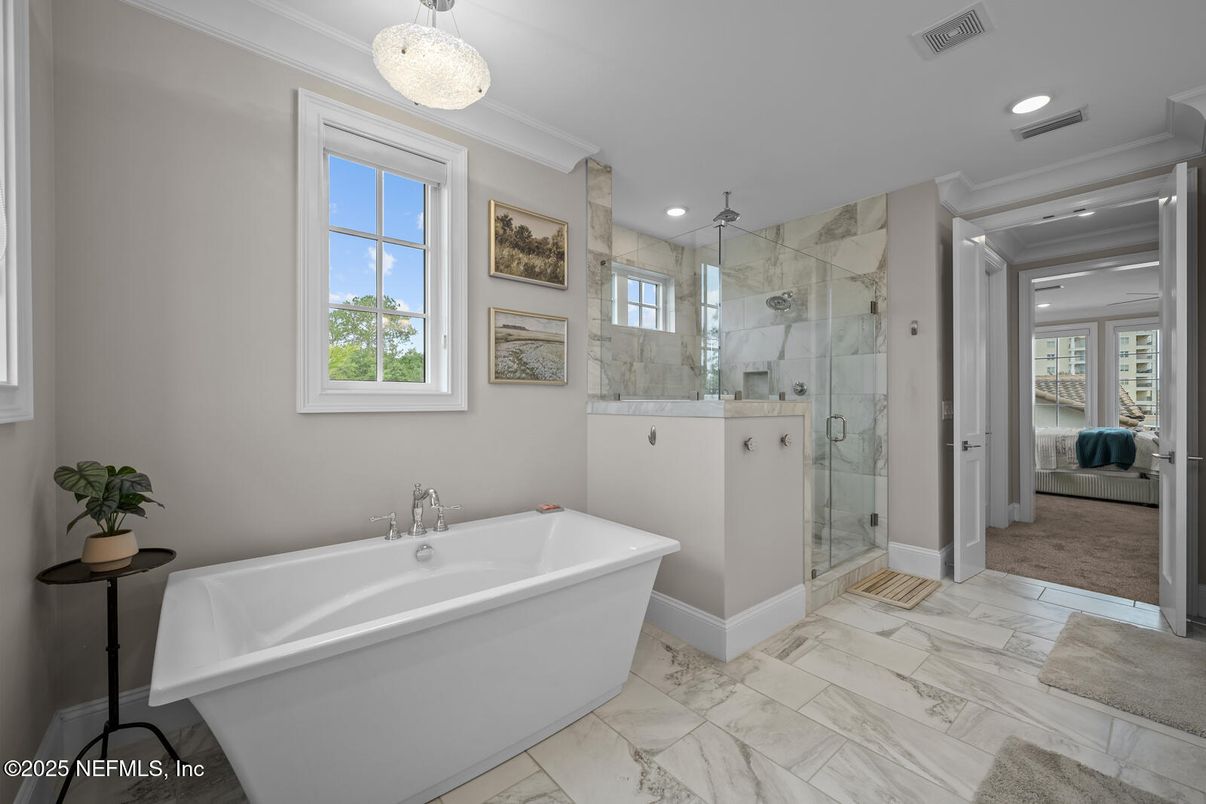 Bathroom, Free Standing Baths, Glass Shower, Interior, Marble, Marble Walls, Pendant Lights, Recessed Lighting