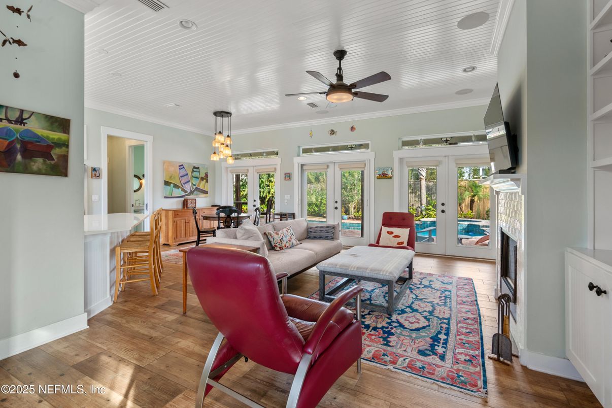 Dining room, Fireplace, Interior, Living room, Pendant Lights, Recessed Lighting, Wood Texture Flooring