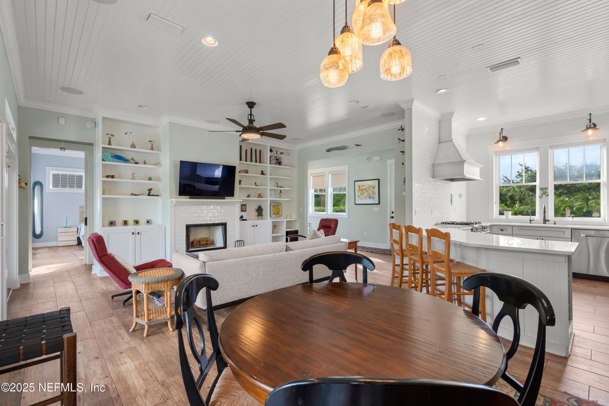 Dining room, Fireplace, Interior, Kitchen, Living room, Pendant Lights, Recessed Lighting, Wood Texture Flooring