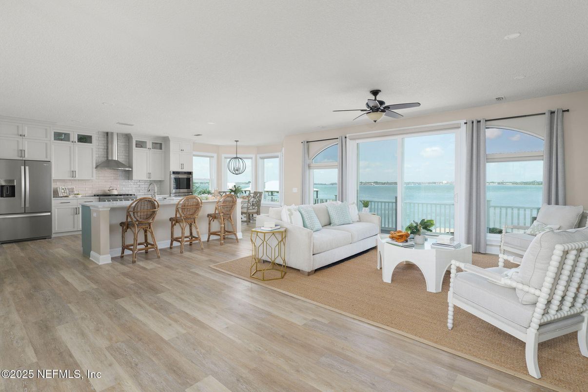 Dining room, Interior, Kitchen, Living room, Pendant Lights, Stainless Steel Appliances, Water, Wood Texture Flooring