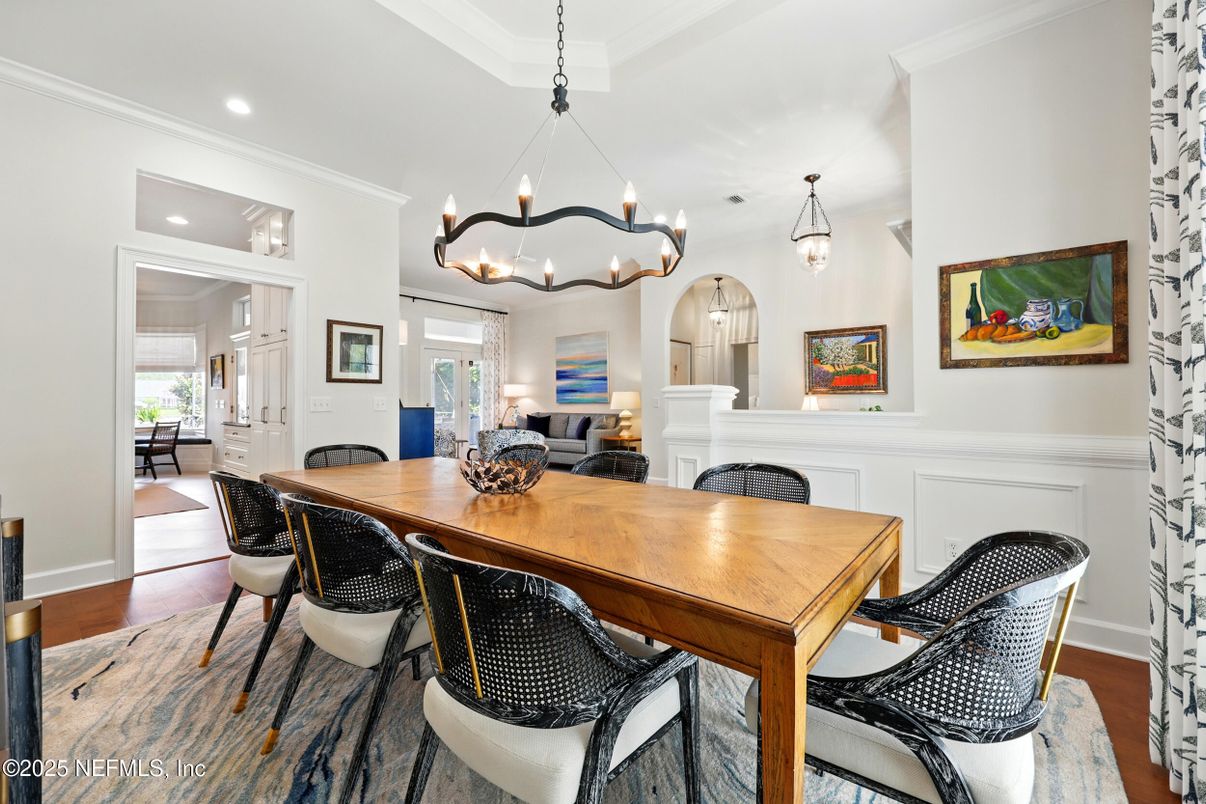 Chandelier, Dining room, Fireplace, Interior, Living room, Pendant Lights, Recessed Lighting, Wood Texture Flooring