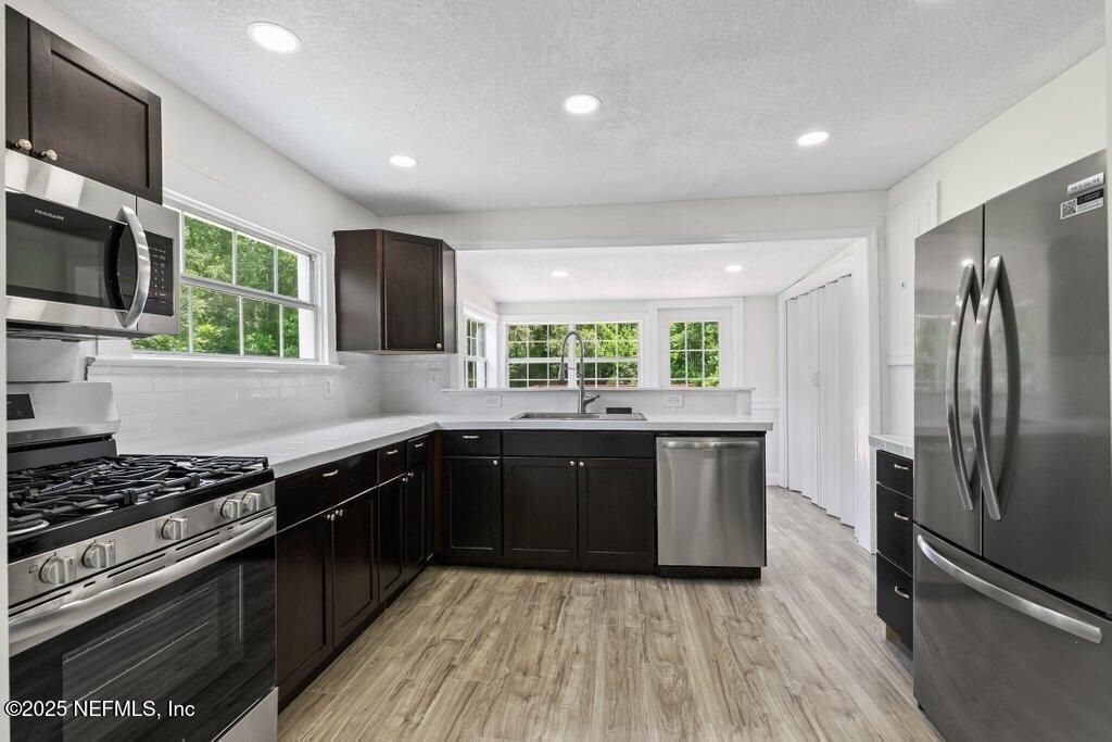 Interior, Kitchen, Recessed Lighting, Stainless Steel Appliances, Wood Texture Flooring